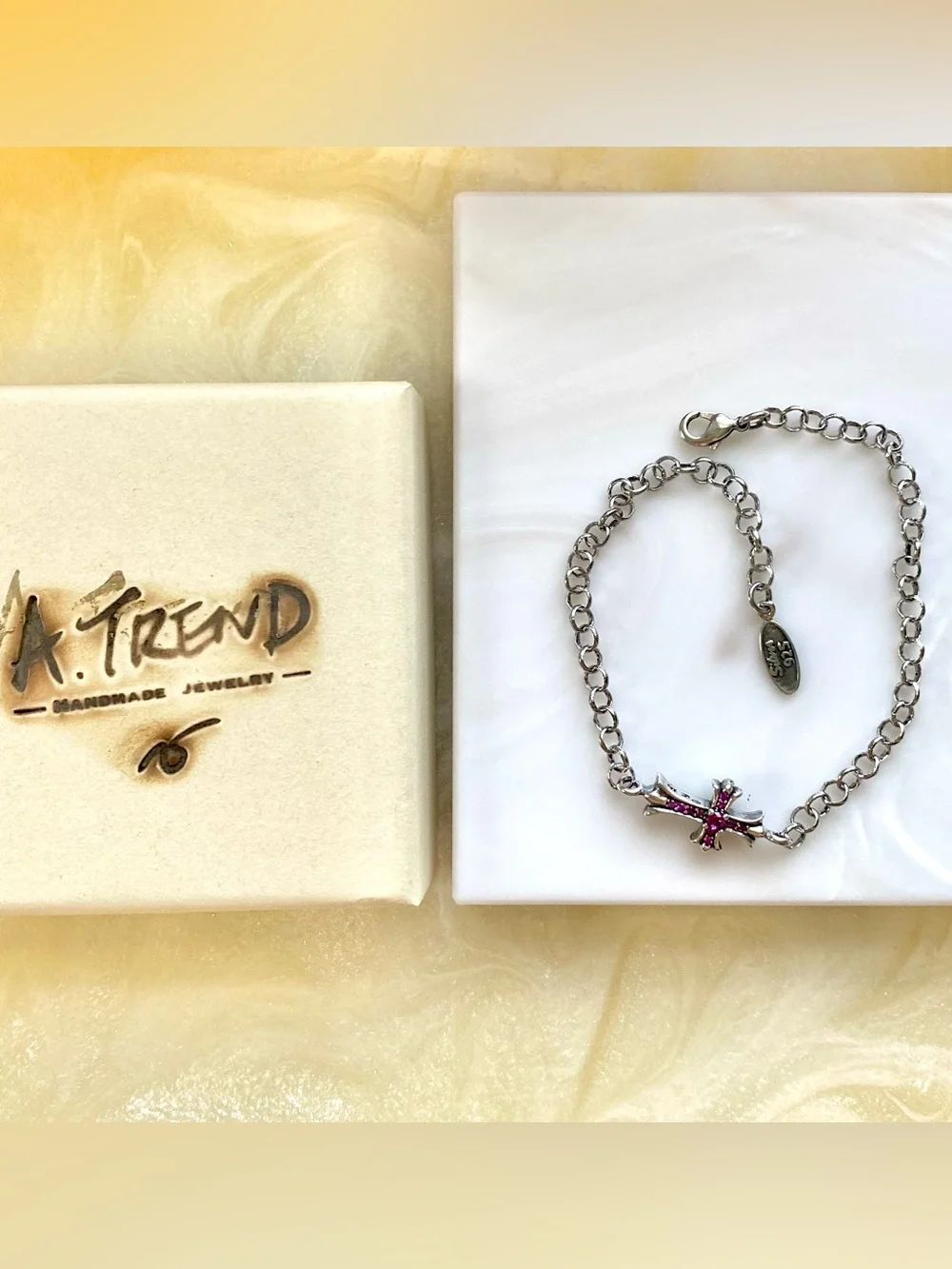 Sterling Silver Cross Bracelet with Pink Stones